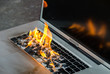 Laptop keyboard on fire and melting