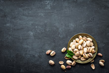 Pistachios Nuts On Dark Background, Top View, Healthy Snack