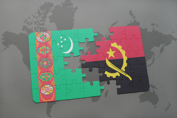 puzzle with the national flag of turkmenistan and angola on a world map