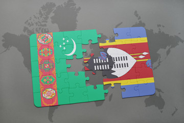 puzzle with the national flag of turkmenistan and swaziland on a world map