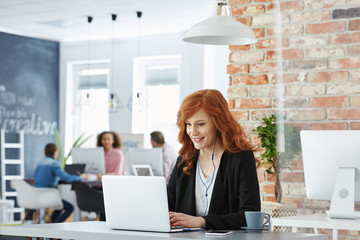 Businesswoman working with laptop