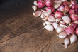 Garlic herbal healthy Thai food ingredient on dark wood background.