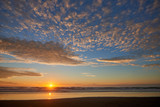 Fototapeta Niebo - Oregon Coast at Sunset. View of a scenic sky and ocean near Barview Jetty.  USA Pacific Northwest.