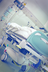 Wall Mural - Hospital room with bed surrounded by equipment