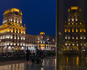 Minsk, Belarus; View to Two towers on Railway station square - City Gates at twilight