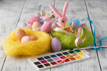 Wall Mural - Easter decoration on table with pastel color eggs