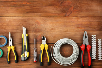 Poster - Different electrical tools on wooden table