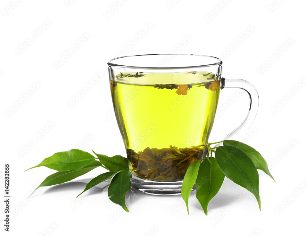 Cup of tea  and green leaves isolated on white