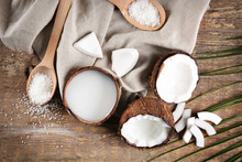 Composition With Fresh Coconut Milk On Wooden Background