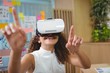 © WavebreakMediaMicro - Female business executive using virtual reality headset