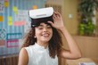 © WavebreakMediaMicro - Portrait of woman using virtual reality headset