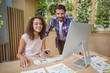 © WavebreakMediaMicro - Portrait of business executives smiling at desk