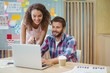 © WavebreakMediaMicro - Graphic designers discussing over laptop