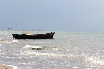 Wall Mural - A fishing boat on the shore of the Black Sea.