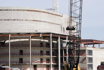 Poster - close up on crane and building construction