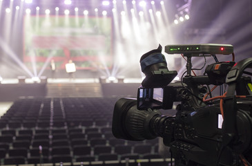 tv camera in a concert hal. Professional digital video camera.