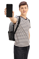 Wall Mural - Teen student showing a phone to the camera