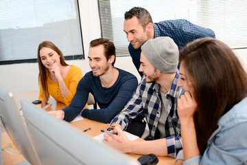 group of five young people student with teacher in computer school classroom learning programming wi