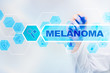 © WrightStudio - Medical doctor drawing melanoma on the virtual screen.
