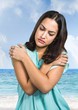 © vectorfusionart - Sad young woman against beach sea