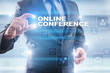 © WrightStudio - Businessman selecting online conference on virtual screen.