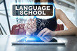 © WrightStudio - Woman using tablet pc and selecting language school.