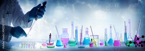 Fotomural Analysis Laboratory - Scientist With Pipette And Beaker - Equipment Chemical