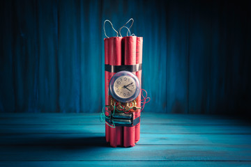 Wall Mural - High contrast image of a timebomb on a wooden background