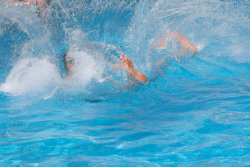  Man jumped into the pool making a lot of splashes