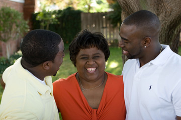 Wall Mural - African American mother and her adult sons.