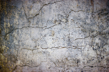 Wall Mural - cracked concrete wall covered with gray cement texture as background for design