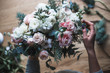 © cherry_d - Florist at work: pretty young blond woman holds fashion modern bouquet of different flowers