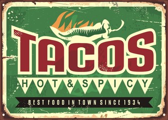 Wall Mural - Hot and spicy tacos advertise on old green metal background