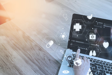 Poster - Medical co working concept,Doctor working with smart phone and digital tablet and laptop computer to meeting his team in modern office at hospital