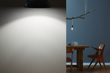 two rooms at night dining table and concept lamp