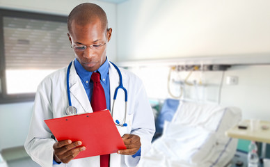 Poster - African doctor reading a clipboard