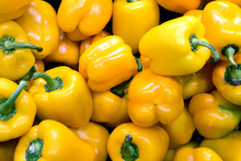 Bunch Of Yellow Peppers In A Greengrocery