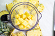 Pineapple slices in a blender