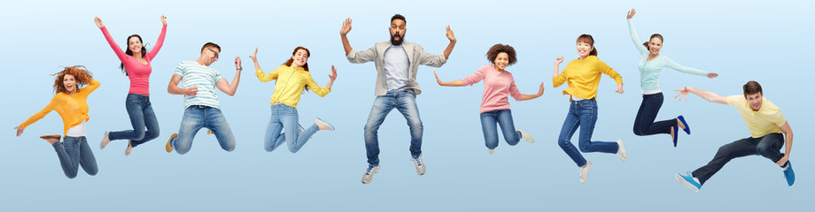 Wall Mural - international group of happy people jumping
