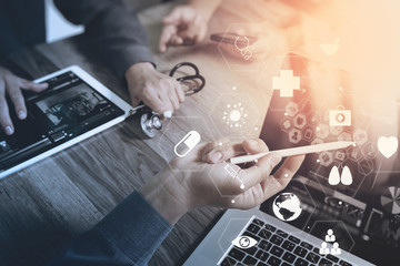 Poster - Medical co working concept,Doctor working with smart phone and digital tablet and laptop computer to meeting his team in modern office at hospital