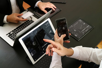 Poster - co working team meeting concept,businessman using smart phone and digital tablet and laptop computer and name tag in modern office