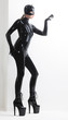 © Richard Semik - standing woman wearing latex clothes
