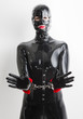 © Richard Semik - portrait of woman wearing latex clothes with handcuffs