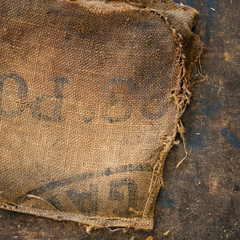 Wall Mural - Old dirty hessian sack bag stamped used as upholstery material