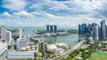 Wall Mural - Aerial view of Singapore business district and city at twilight in Singapore, Asia.