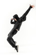 © master1305 - The silhouette of one hip hop male break dancer dancing on white background