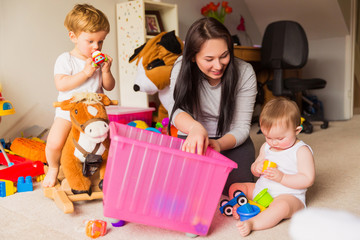 babysitter playing with children