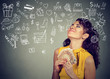 © pathdoc - Young woman with money dreaming how to spend it all