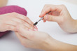 © Maksymiv Iurii - Woman hands in a nail salon receiving a manicure procedure. SPA manicure.