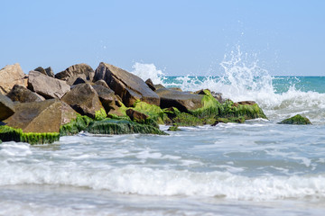 Water splash on stone beach 3